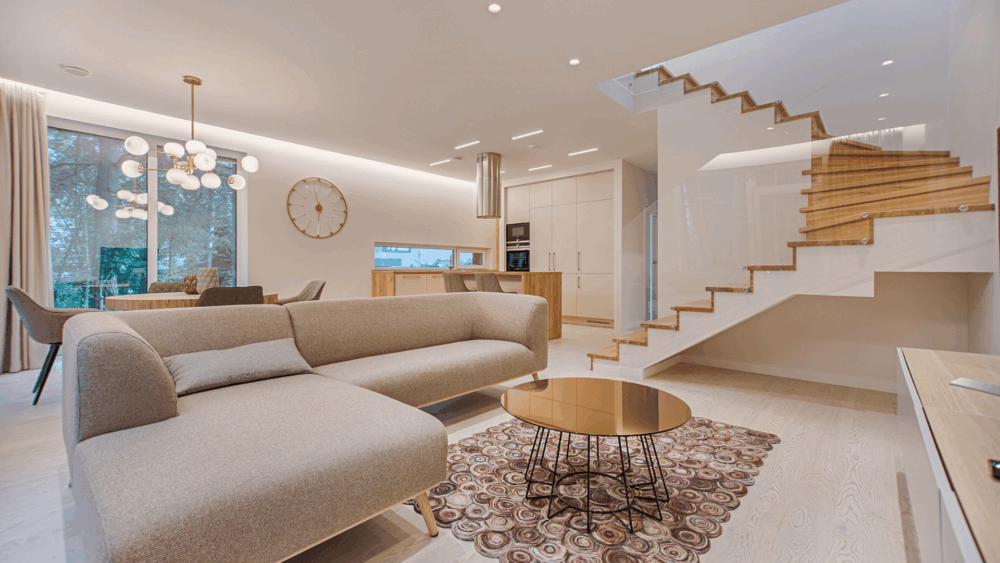 Custom Home Interior shot of a new custom home with staircase behind glass.