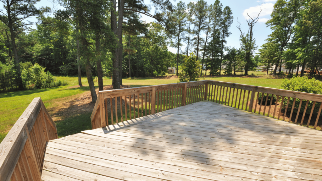 Custom wooden back deck and railing.