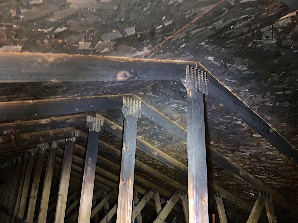 Fire damage to roof beams.