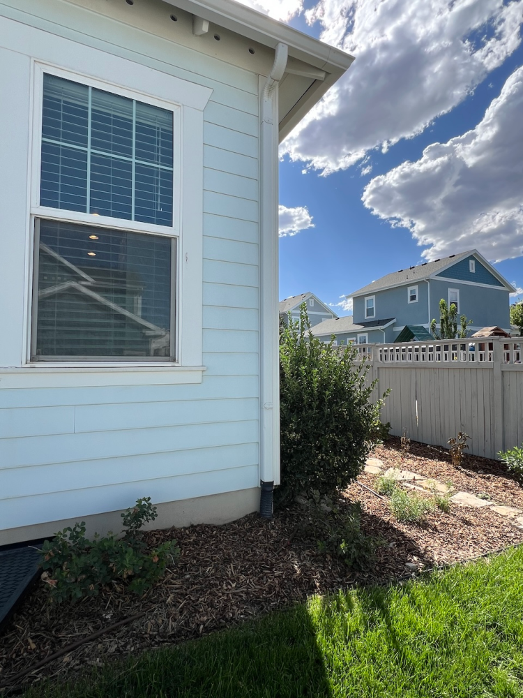 Gutters and extenders on a home showing proper drainage.