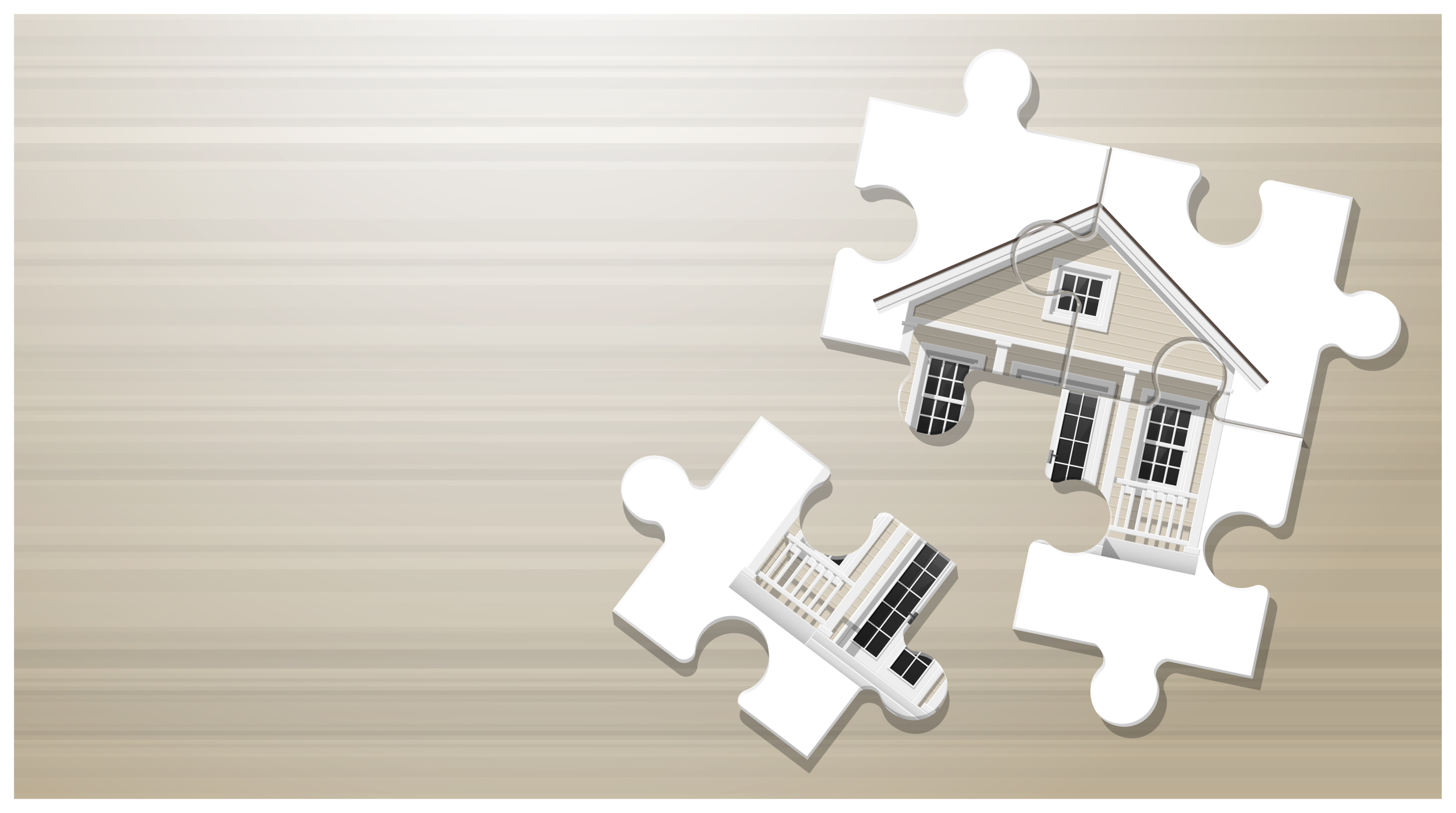 Partially assembled puzzle pieces depicting a house. 