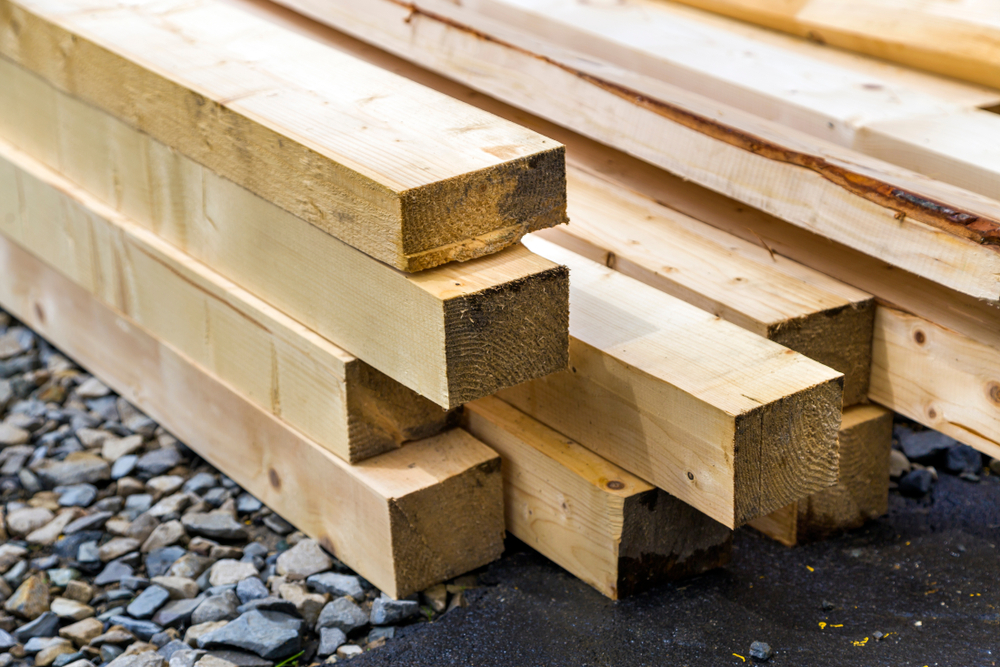 Stack of wooden beams for building.